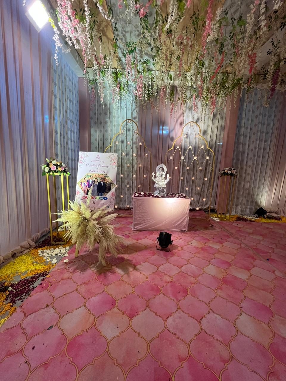 Welcome corner with Ganesha idol and floral vines